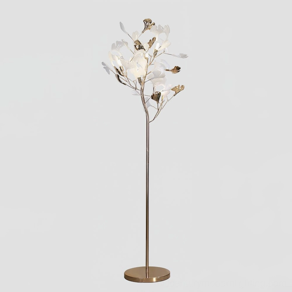 Ginkgo Leaf Floor Lamp full front view, brushed gold metal pole, white ceramic leaves, round gold base on pure white studio background