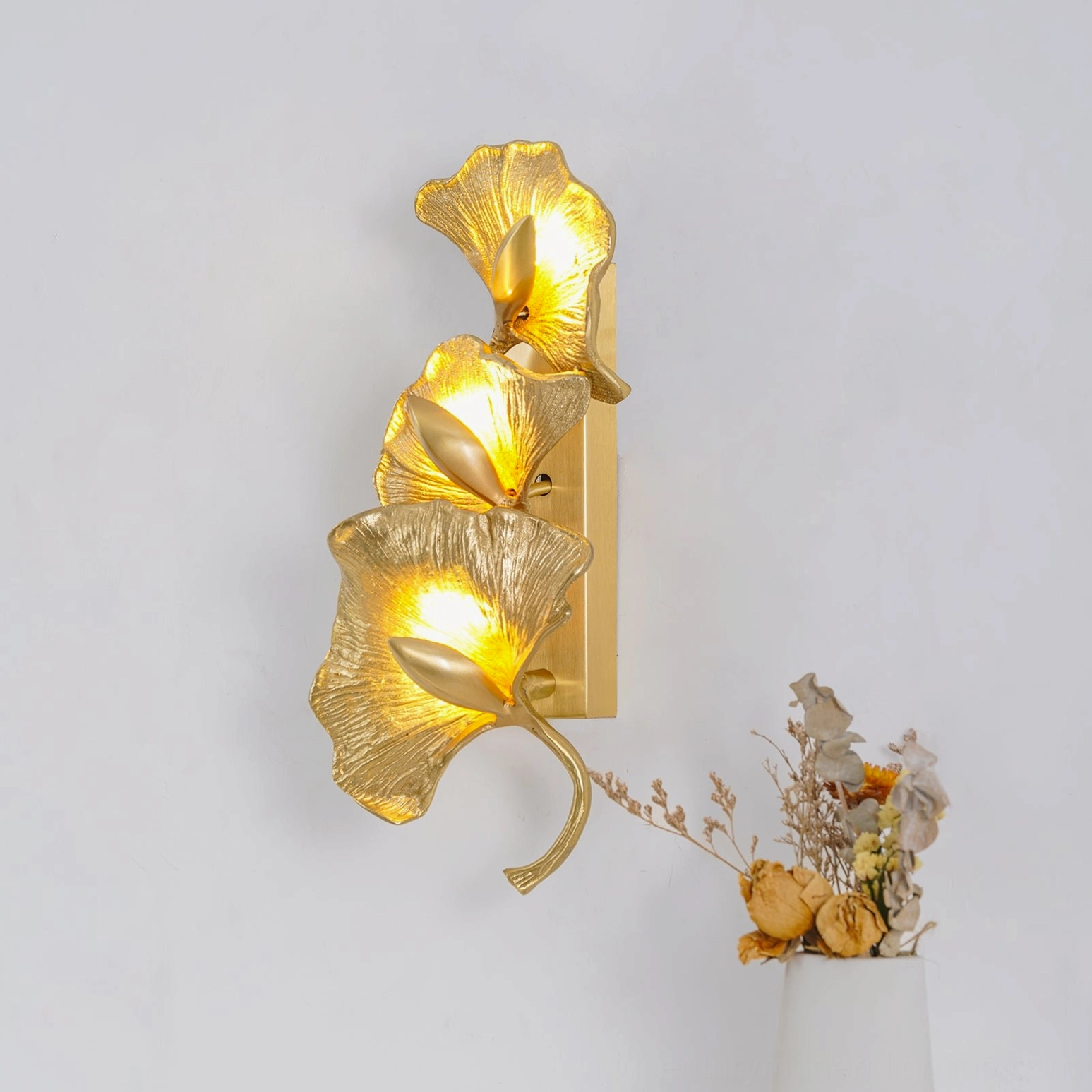 Ginkgo leaf wall lamp mid-century modern sconce design three leaves brass gold aesthetic