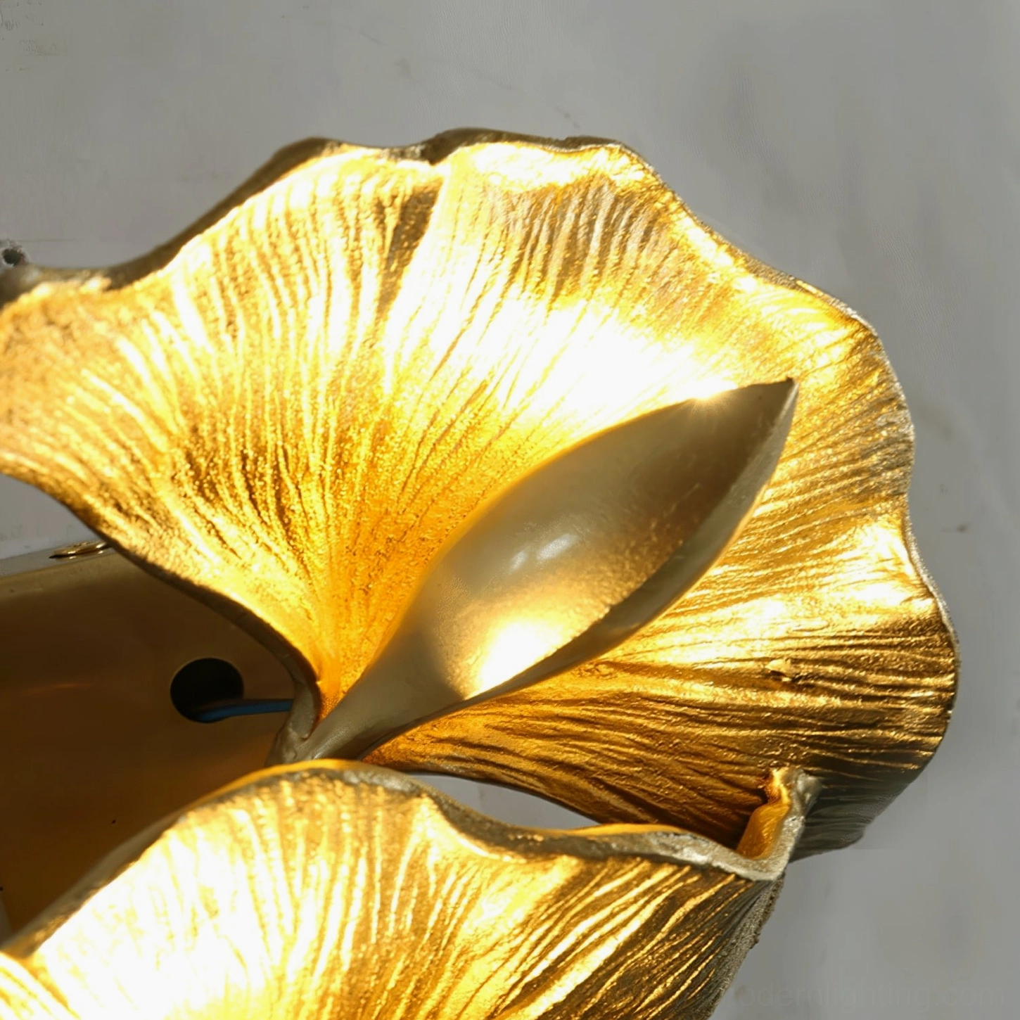 Ginkgo leaf wall lamp design detail premium brass construction gold finish leaf veins