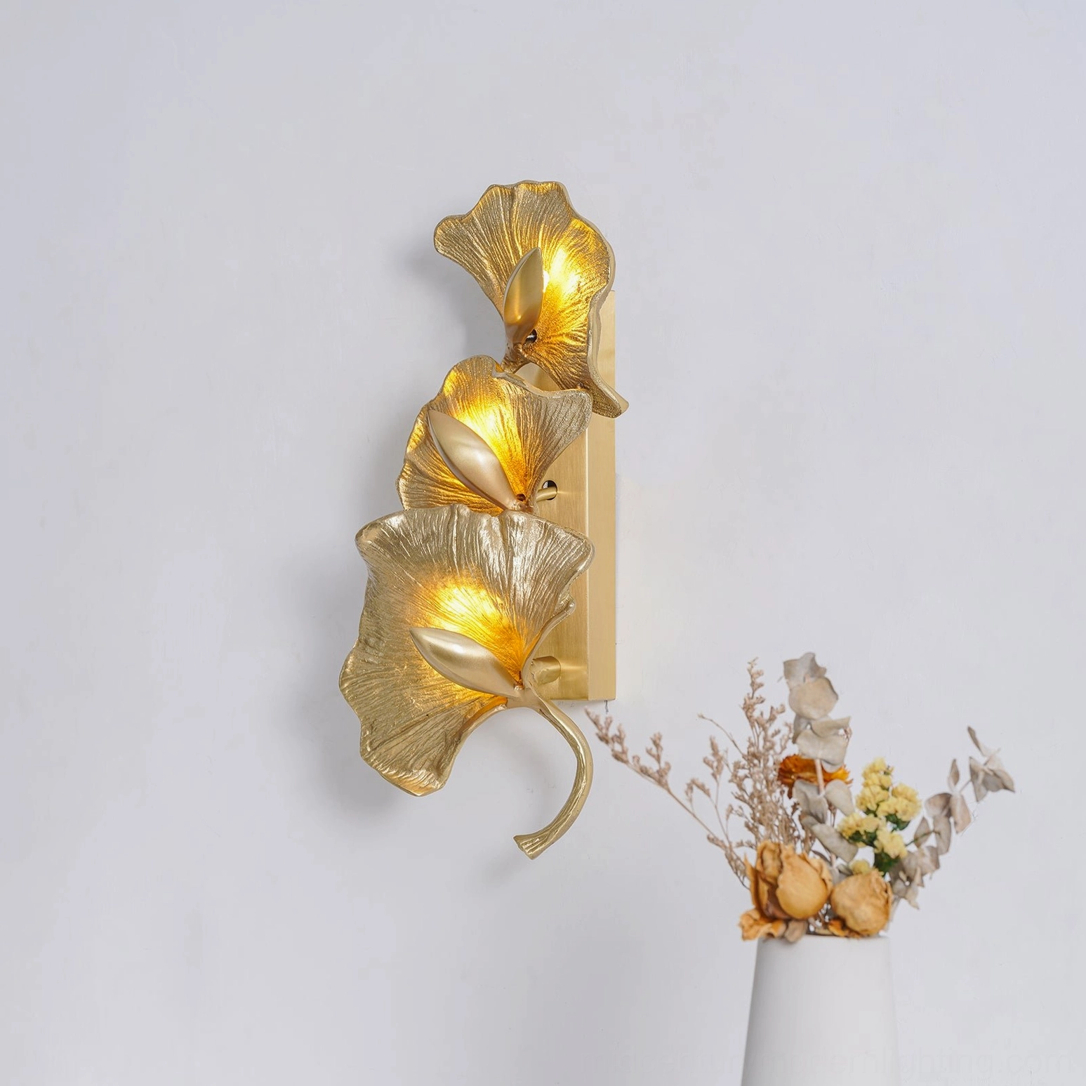 Ginkgo leaf wall sconce brass gold finish multiple viewing angle mid-century modern lighting