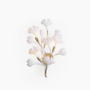 Ginkgo leaf wall sconce in gold and white ceramic, front view on studio white background, mid-century modern botanical light fixture