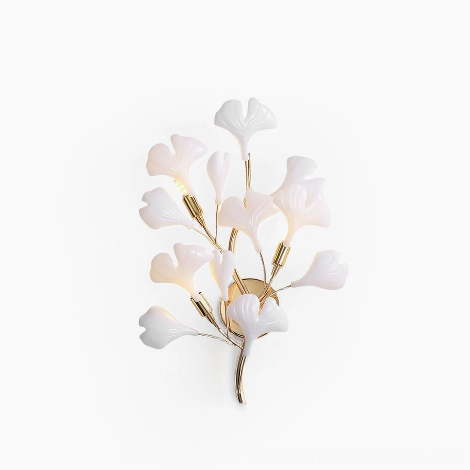 Ginkgo leaf wall sconce in gold and white ceramic, front view on studio white background, mid-century modern botanical light fixture