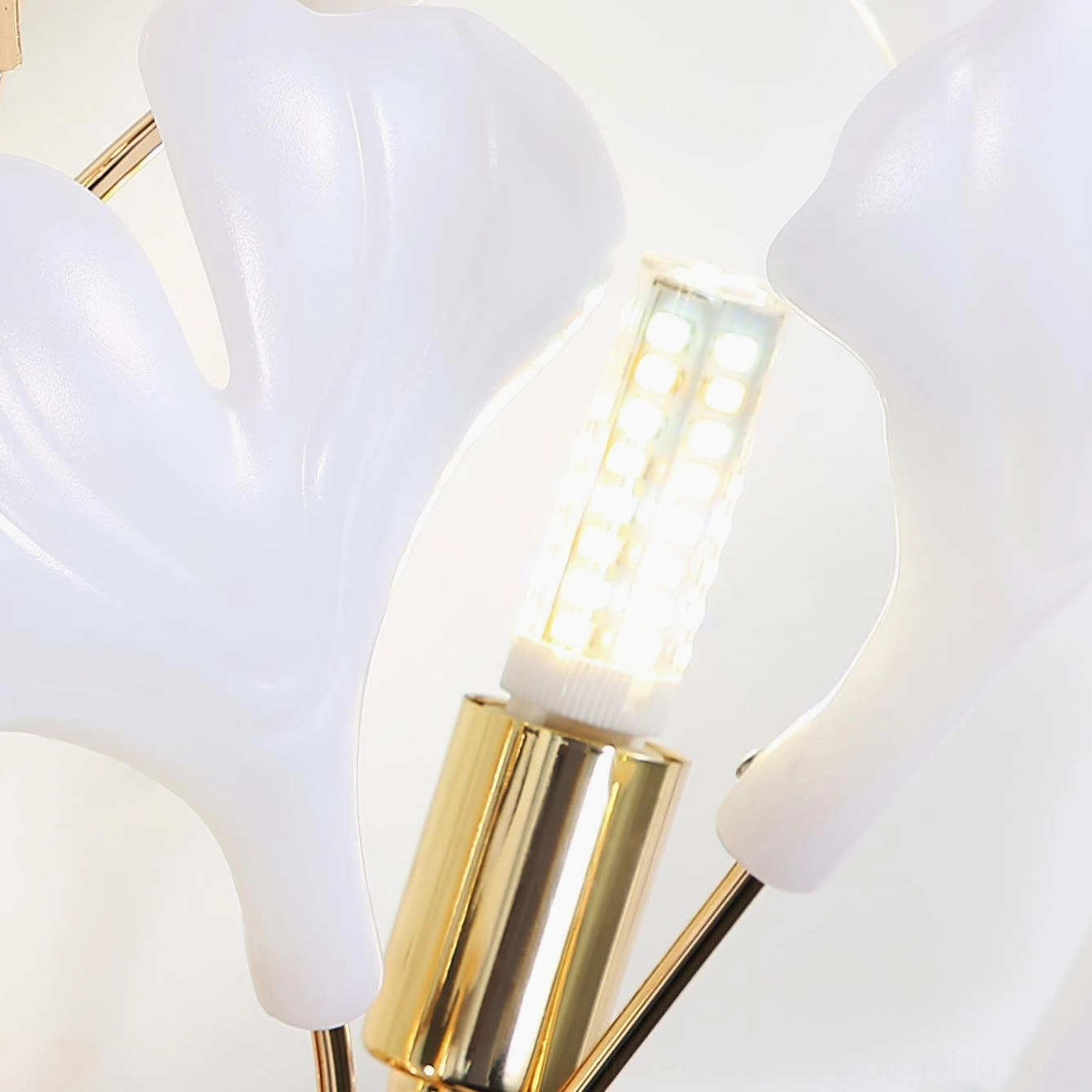 Ginkgo leaf sconce bedroom reading light setup, bedside mounting, warm illumination functional design