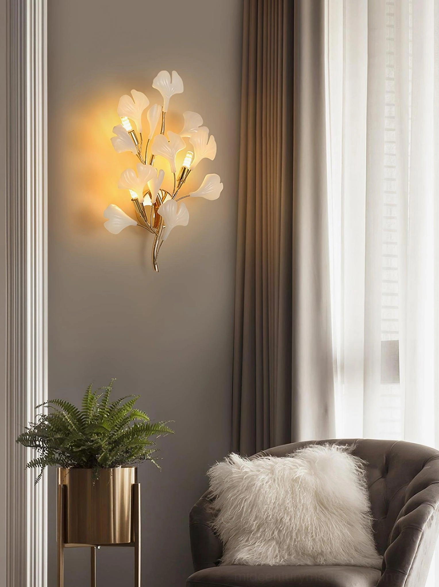 Ginkgo wall sconce mounted on accent wall, gallery-style art installation, mid-century modern living room