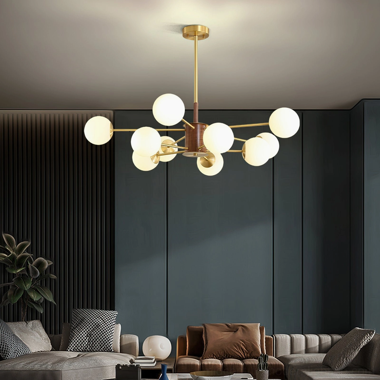 Gino brass and glass chandelier glowing warmly in contemporary luxury living room setting