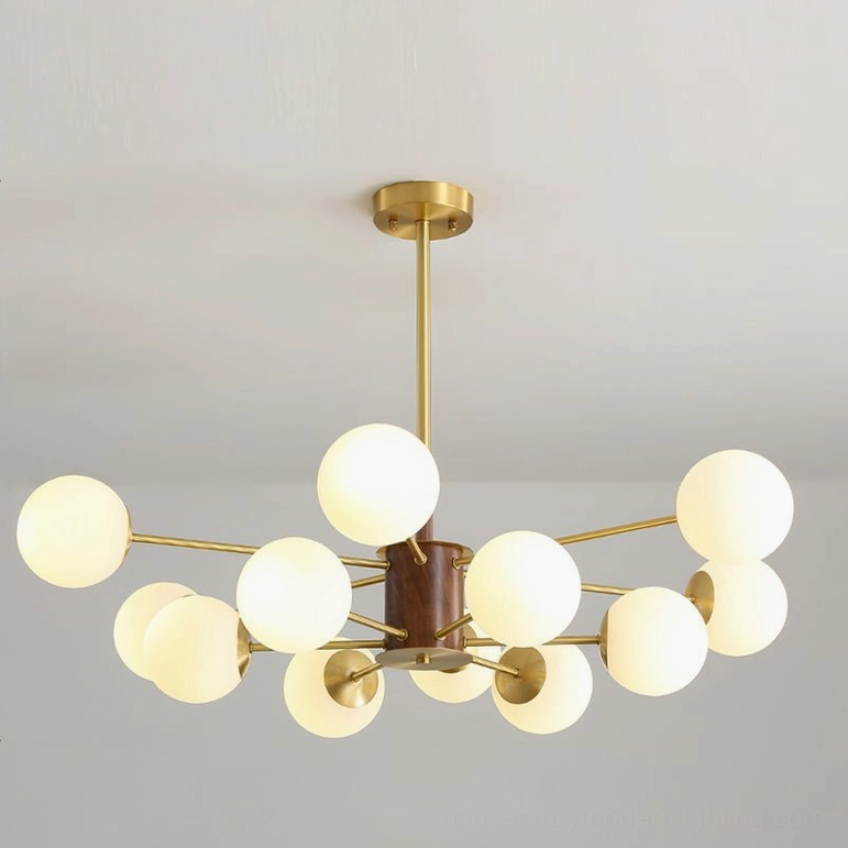Gino glass chandelier bottom-up view studio shot with polished brass hardware and warm glow