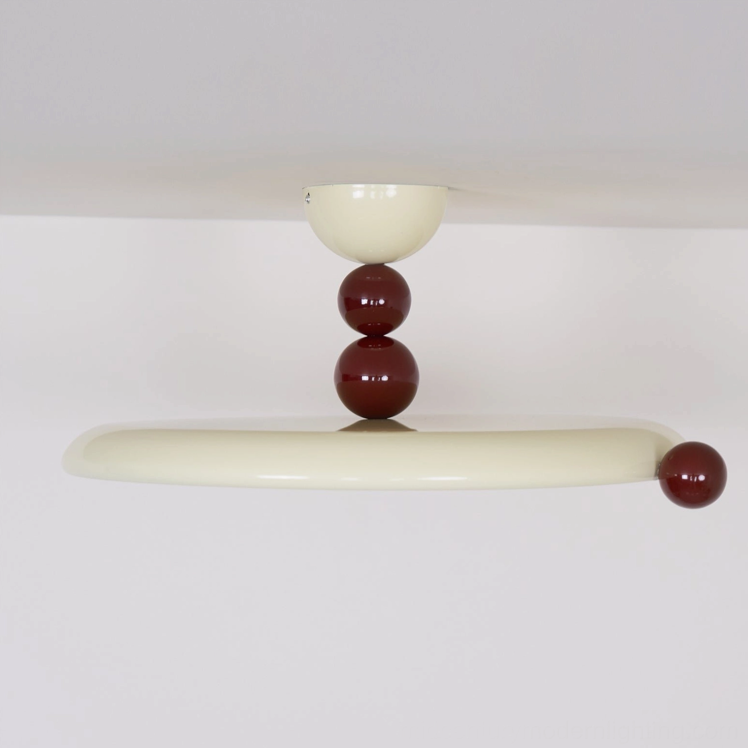 Gino contemporary ceiling lamp unlit flat circular design in cream and burgundy finish, side overhead angle