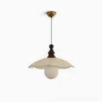 Giselle pleated fabric pendant light studio view - mid-century modern design with walnut wood and brass ceiling cap