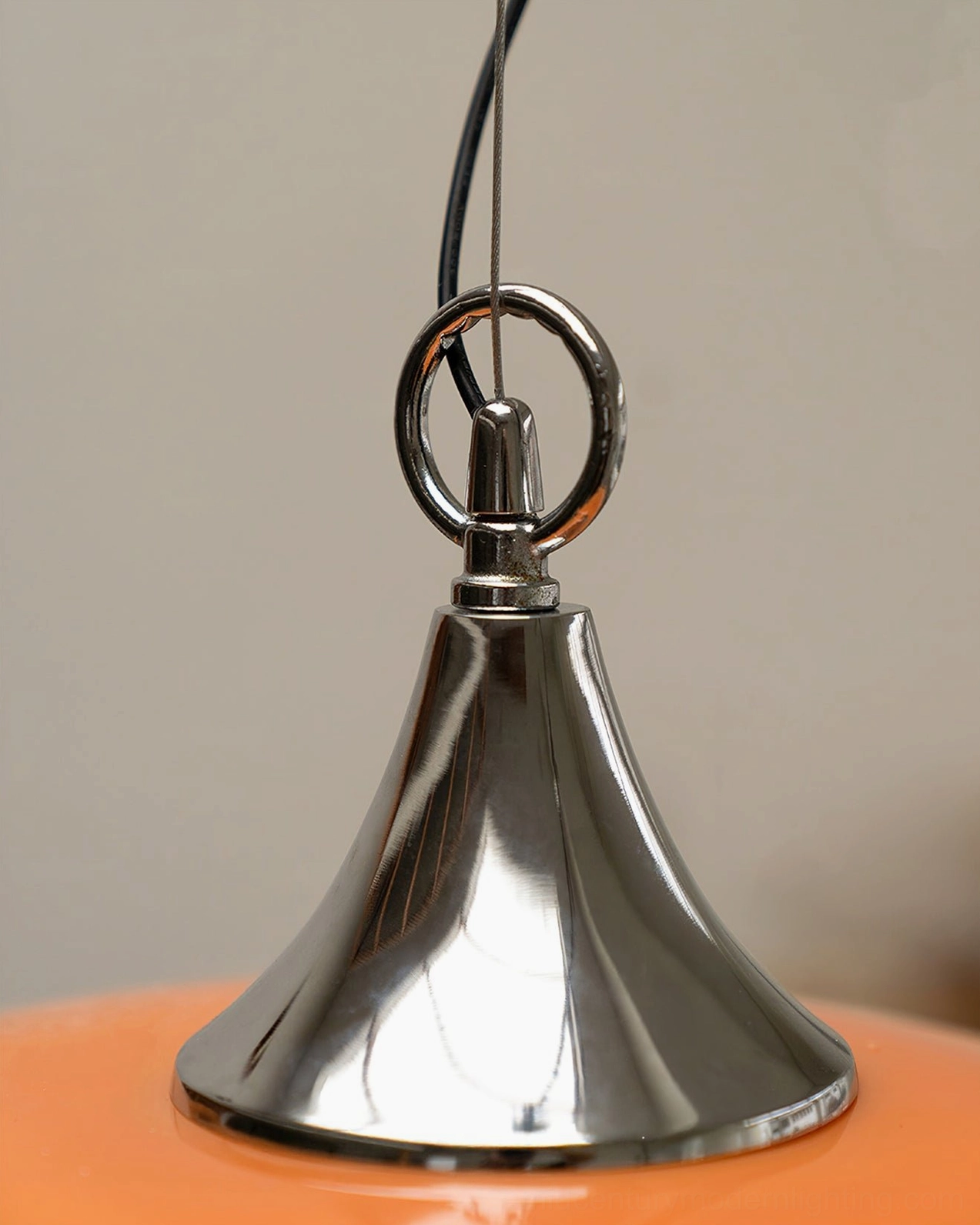 Chrome metal ceiling fixture hardware detail polished shiny suspension loop hanging mechanism