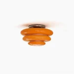 Gispen orange tiered ceiling light front view studio shot mid-century modern lighting fixture