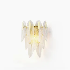 Giulia brass wall lamp with ribbed glass featuring modern sculptural design on white background