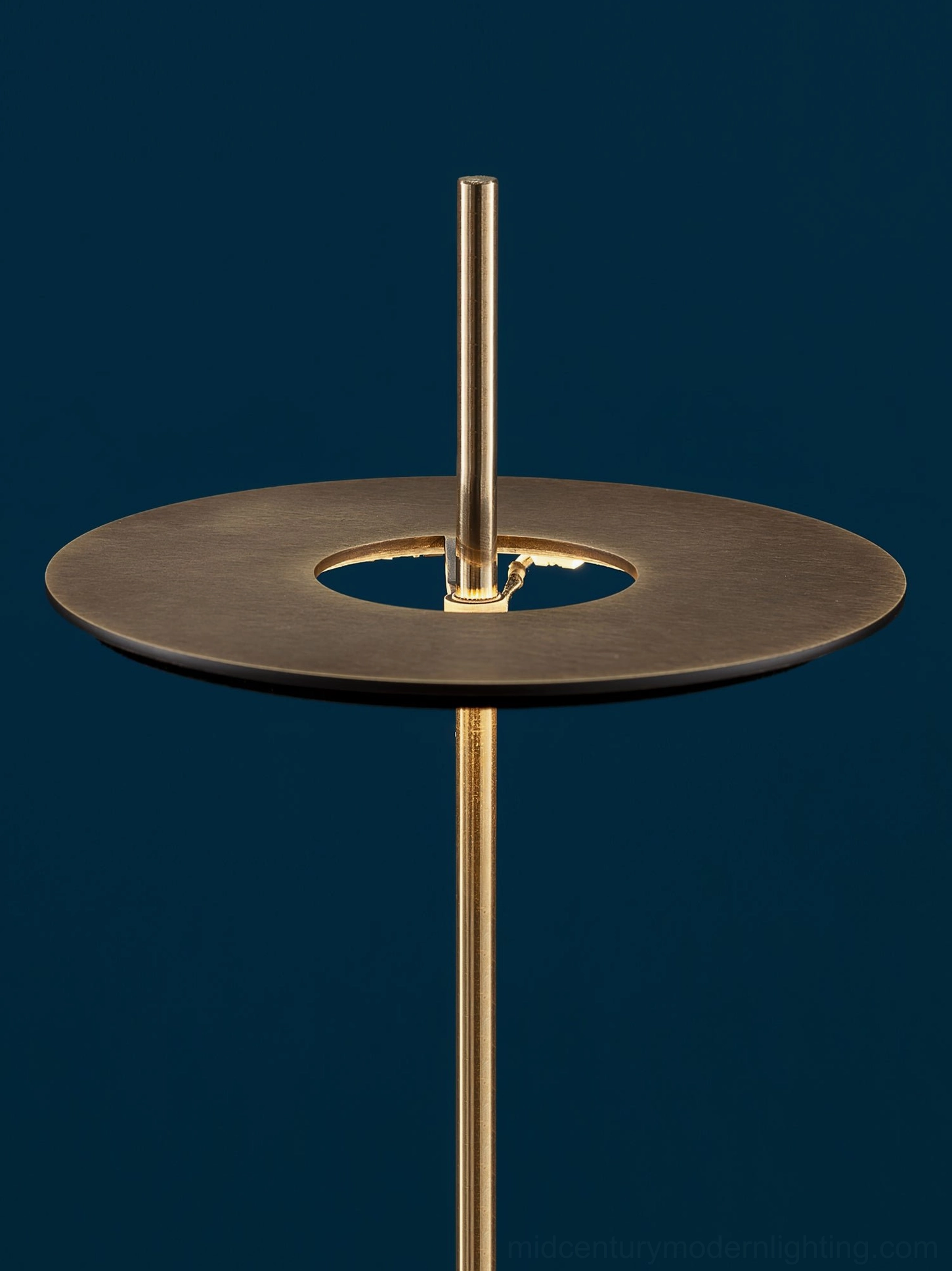 Giulietta minimalist disc table lamp showing 150cm cord with regional plug options for global use