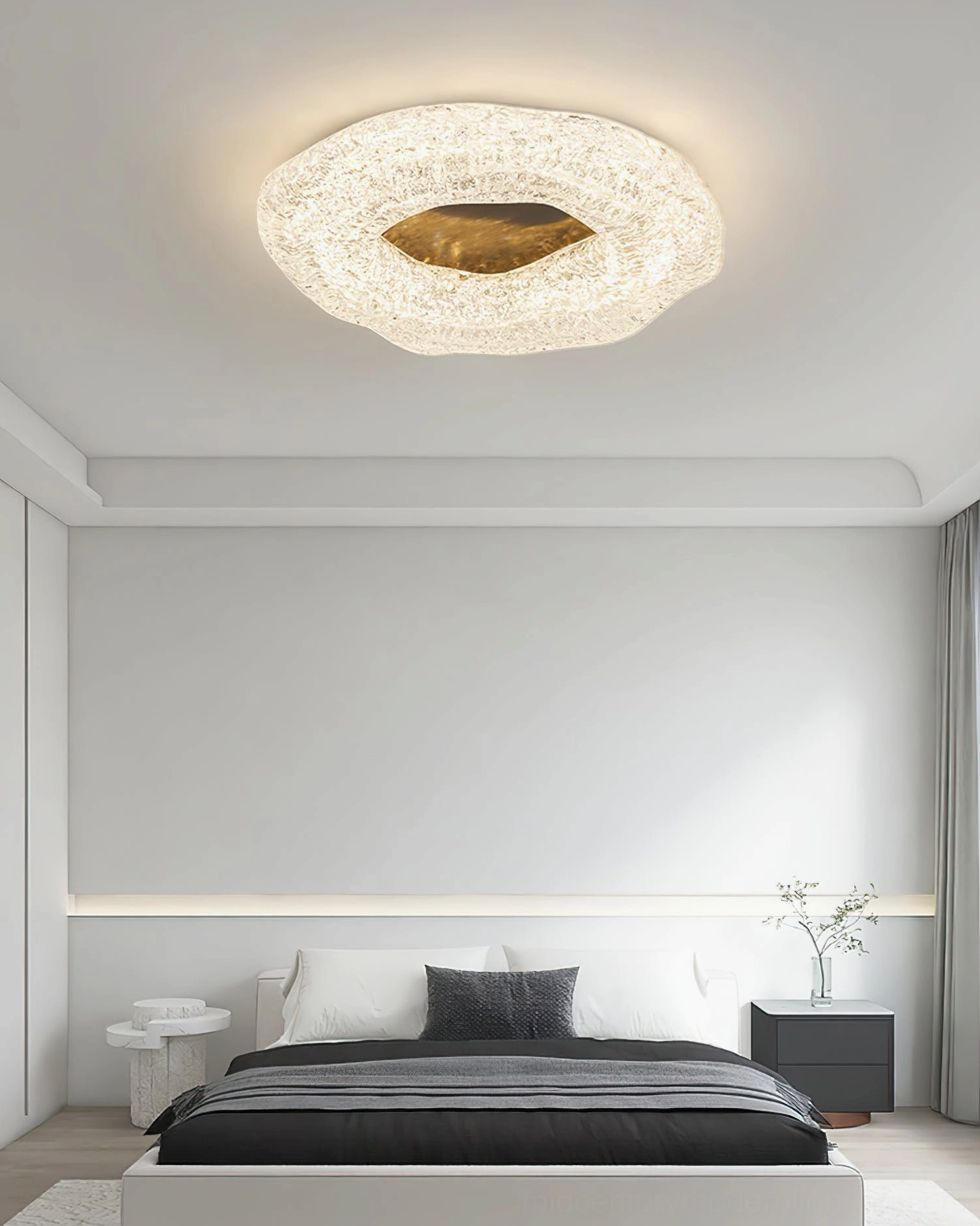 Glacial resin ceiling light installed in modern master bedroom with gold inner trim