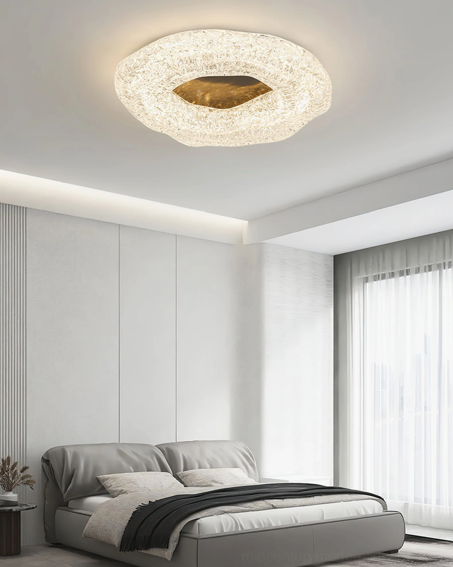 Glacial ceiling light with golden glow in minimalist bedroom with floor windows