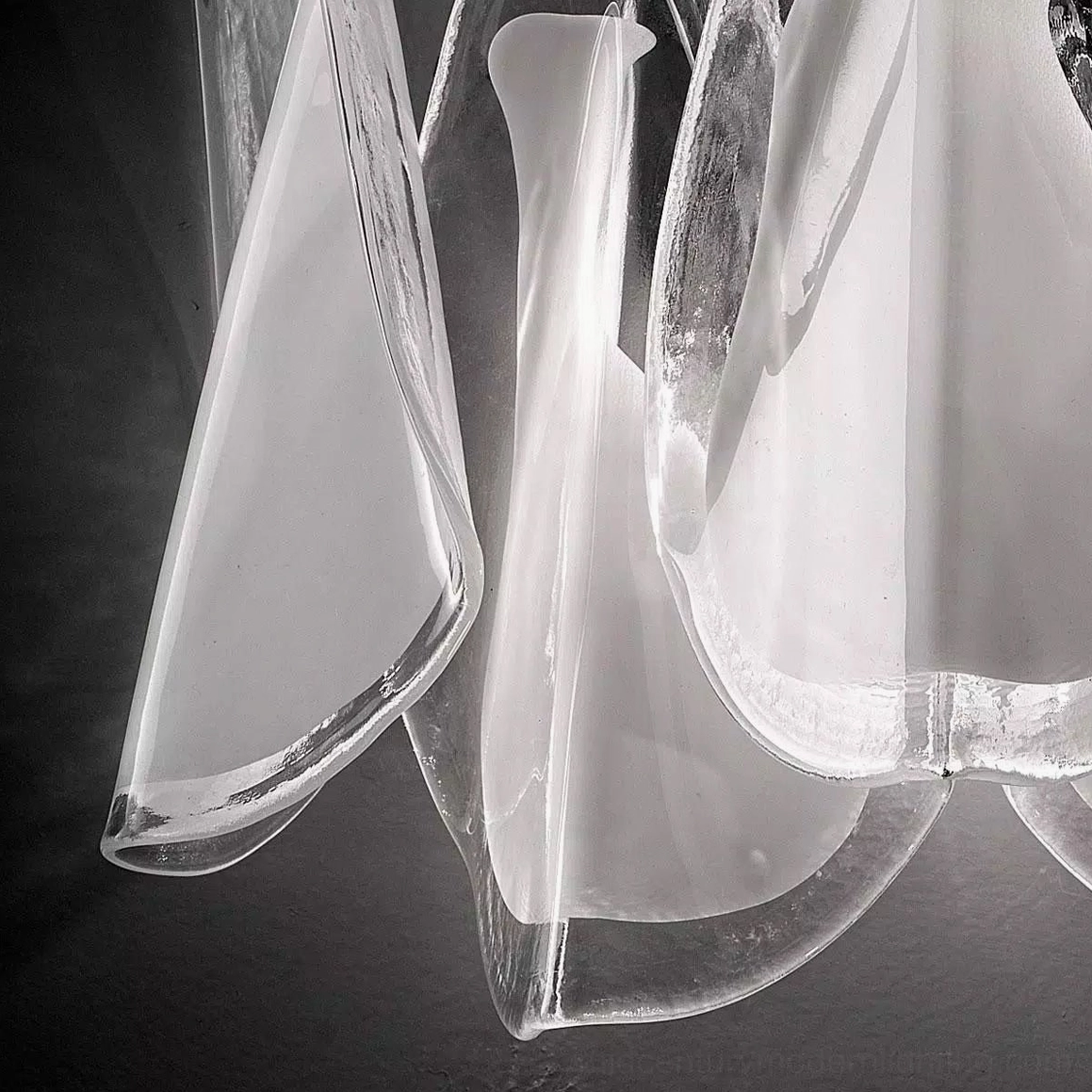 Glacier wall lamp overlapping layered petal shade architecture in frosted and clear glass