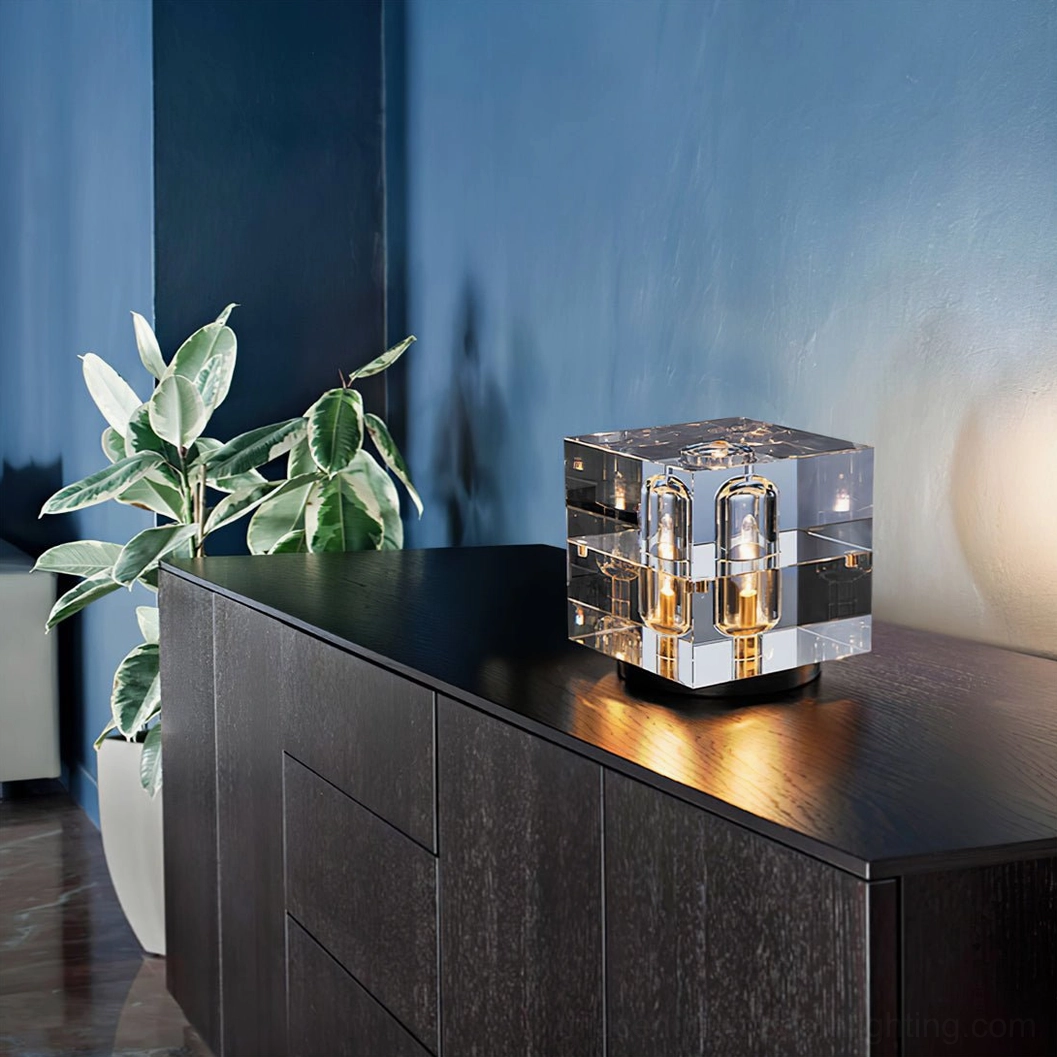 Glacon Cube lamp on modern living room side cabinet with green potted plant companion