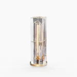 Glacon Cylinder optical crystal table lamp with 8 exposed filament bulbs, polished brass base, studio view