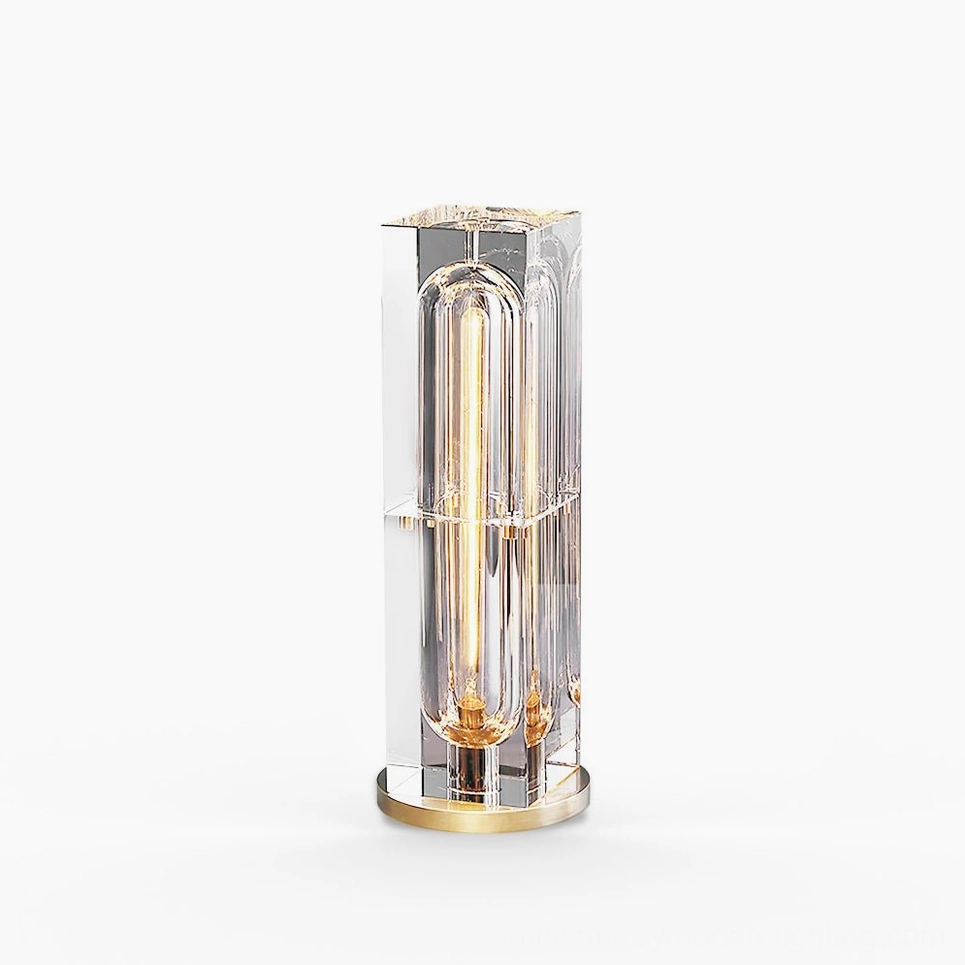 Glacon Cylinder optical crystal table lamp with 8 exposed filament bulbs, polished brass base, studio view