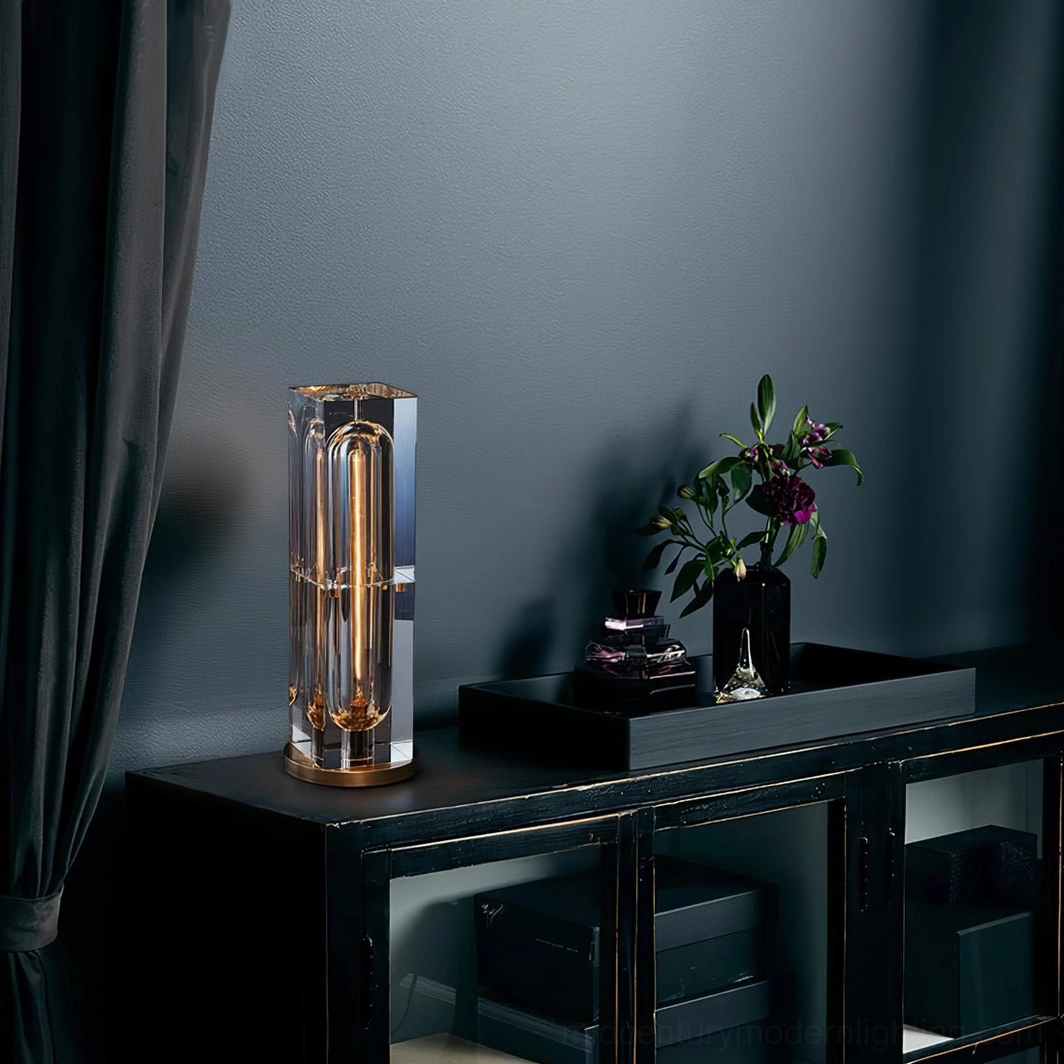 Glacon Cylinder crystal lamp on living room console table with floral ornament accent