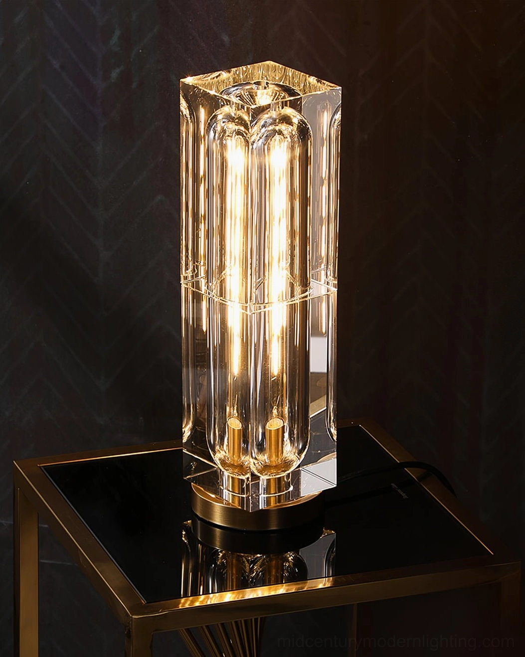 Glacon crystal table lamp side profile view with brass plinth base detail