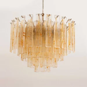 Elevated perspective of layered glass chandelier showing hanging suspension rod and architectural tier construction
