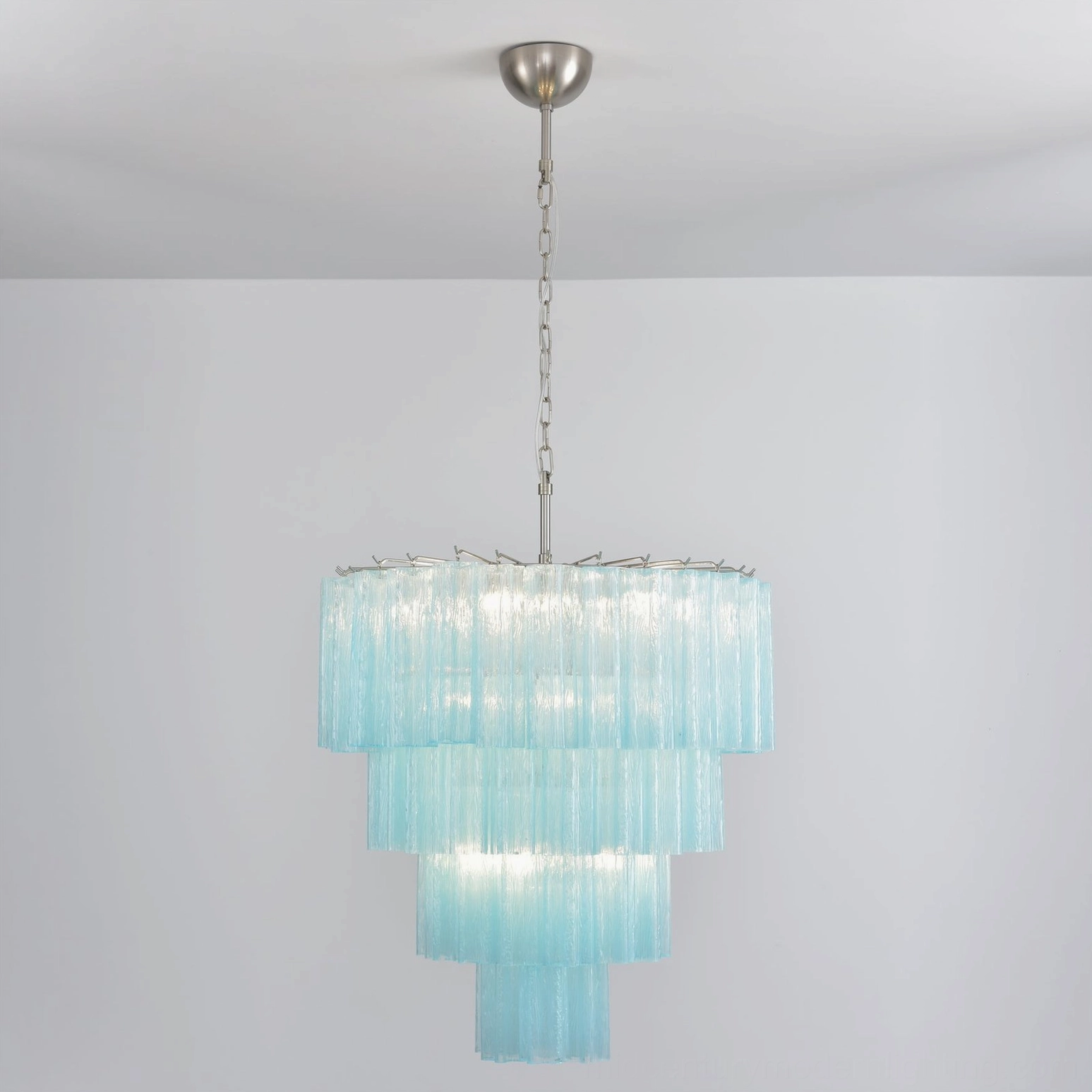 Tiered glass chandelier light diffusion effect textured ripple glass unique illumination
