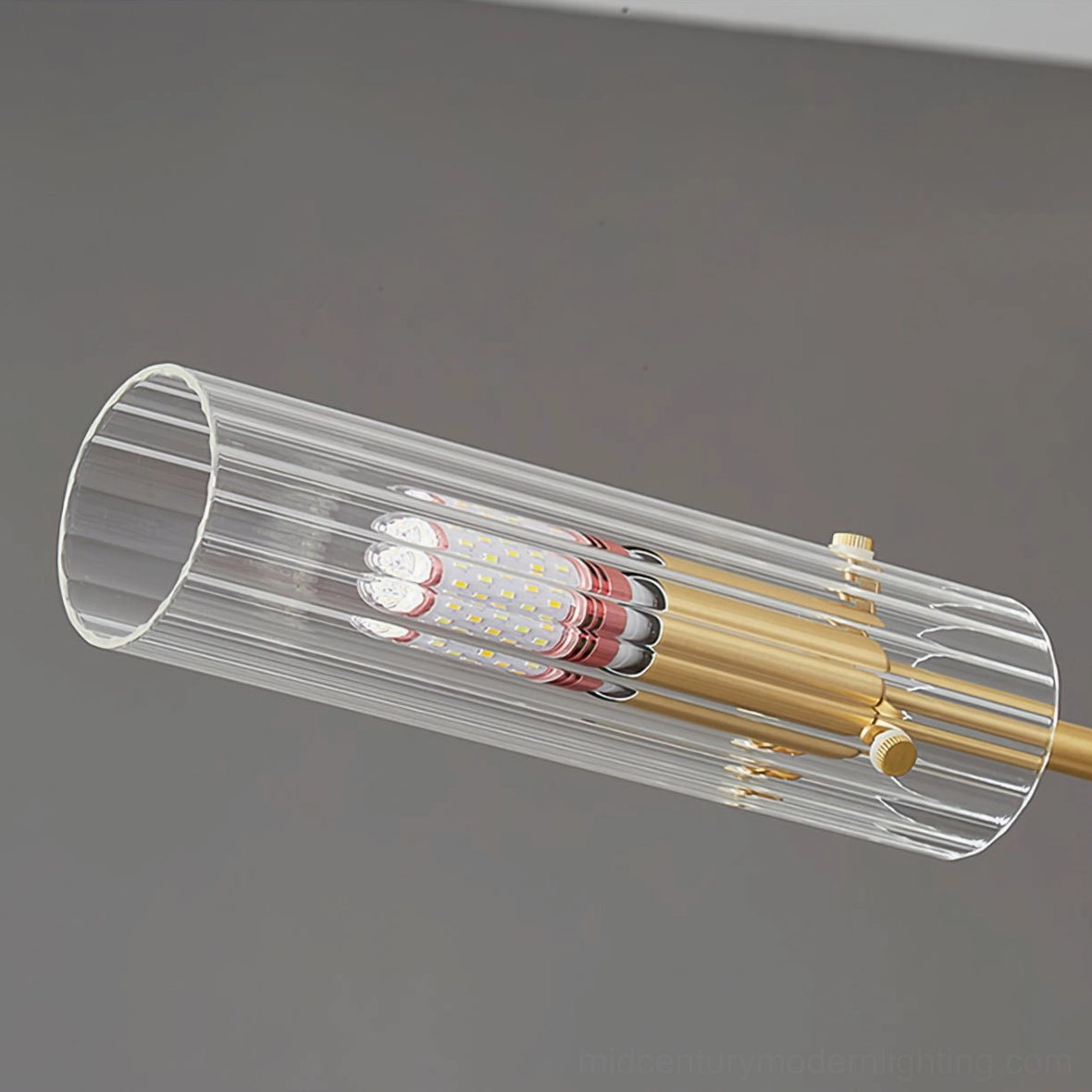 Ribbed glass lamp assembly close-up front view with LED bulb visible interior