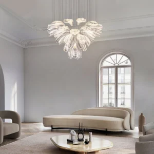 Glass lotus chandelier suspended in minimalist high-ceiling living room with warm neutral décor, mid-century modern lighting design