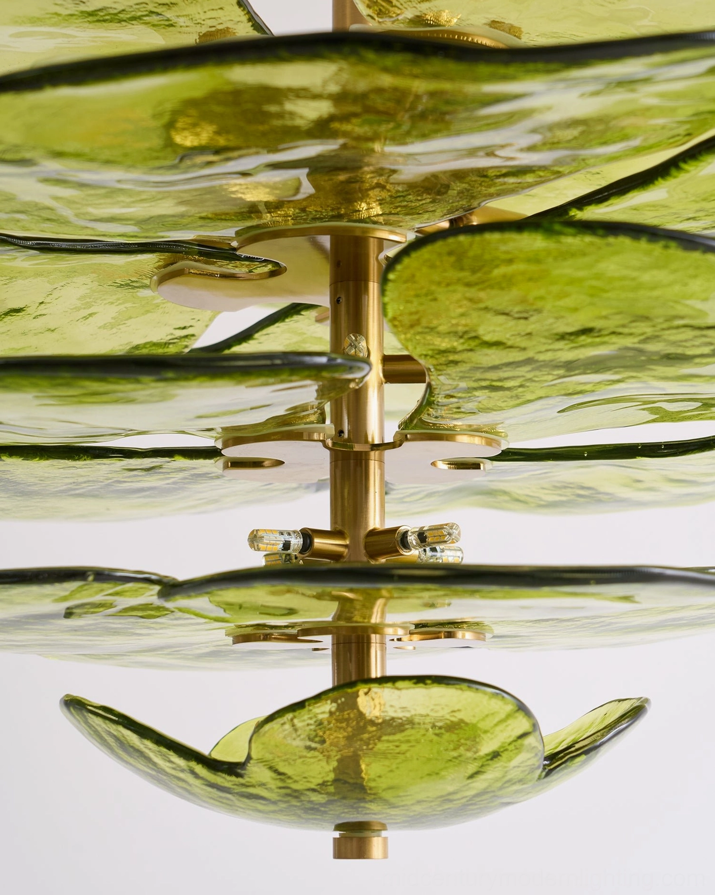 Glass lotus leaf light fixture showing botanical inspiration and contemporary design aesthetic