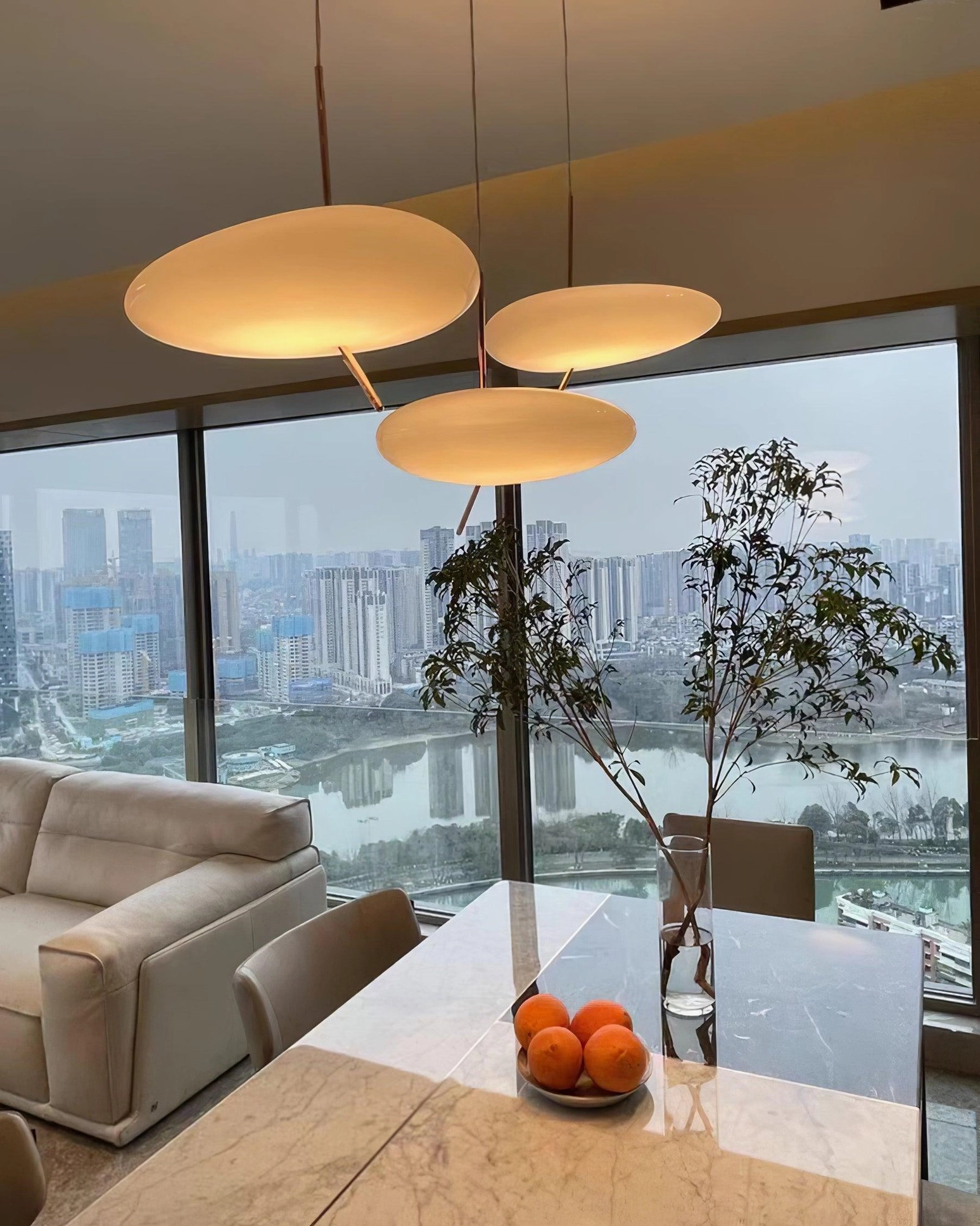 Glass shade pebbles pendant light showcasing premium crystal-clear material and integrated LED illumination