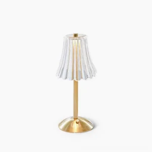 Glitters gold table lamp with ribbed clear glass shade, front studio view showcasing Art Deco-inspired design