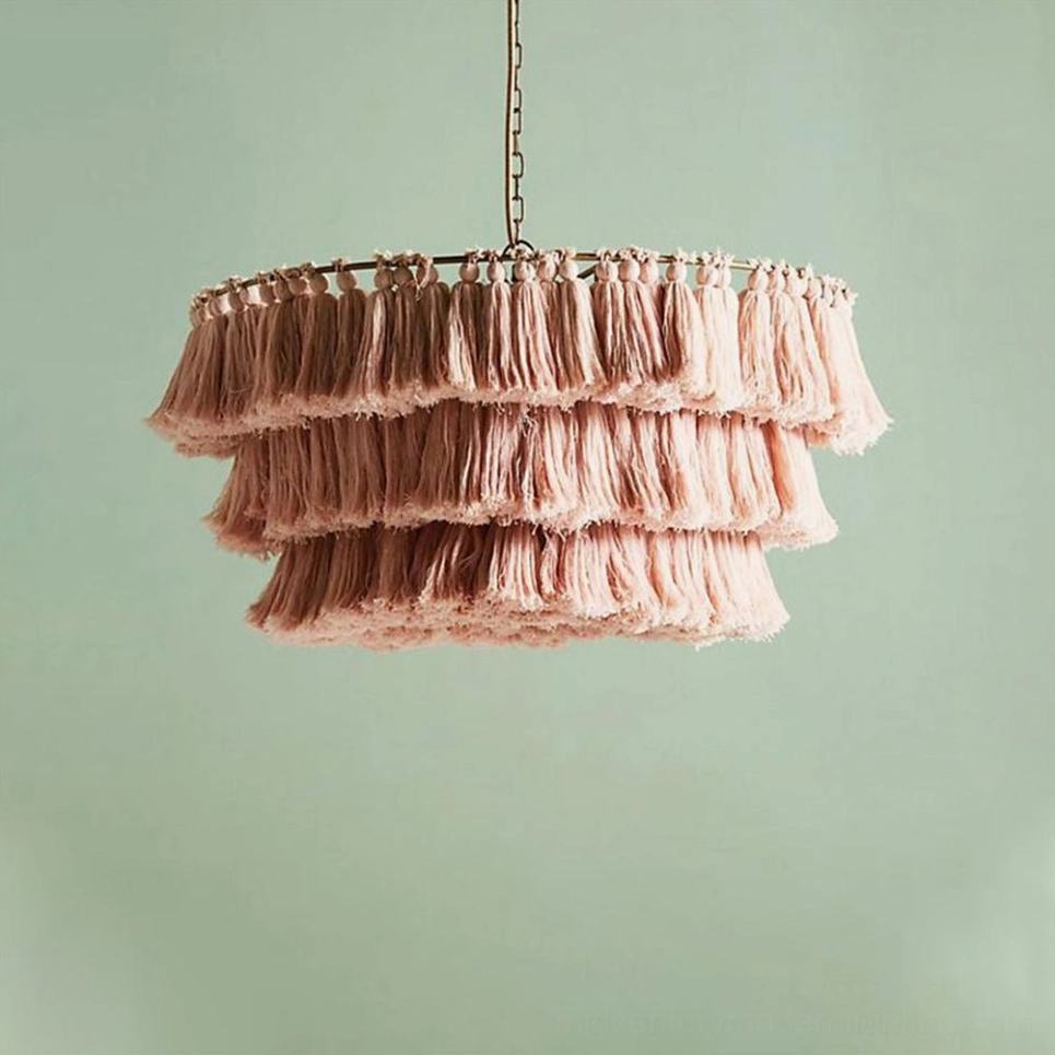 Multicolor tiered tassel chandelier creating focal point in globally-inspired bohemian living area