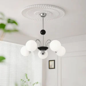 Ceiling-mounted globe chandelier with decorative ceiling rose installed in minimalist white room with window blinds
