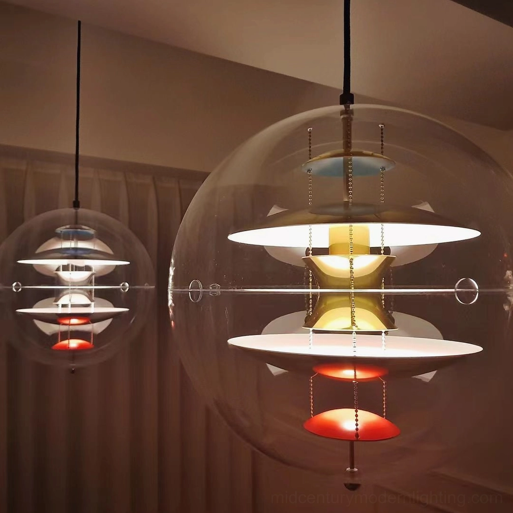 Globe pendant light fixture creating ambient lighting in residential interior space