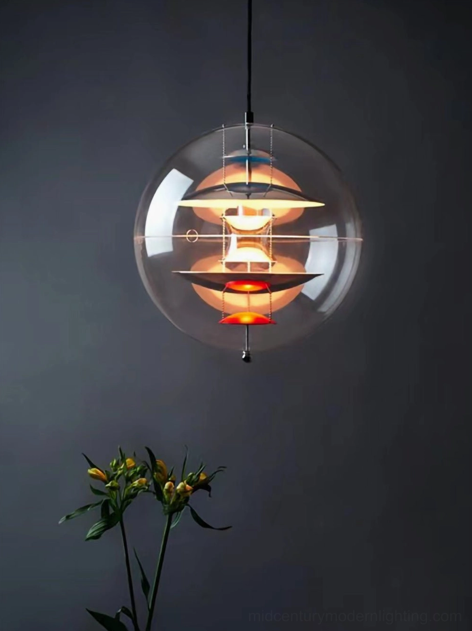Globe pendant with gold or chrome finish option in elegant interior setting