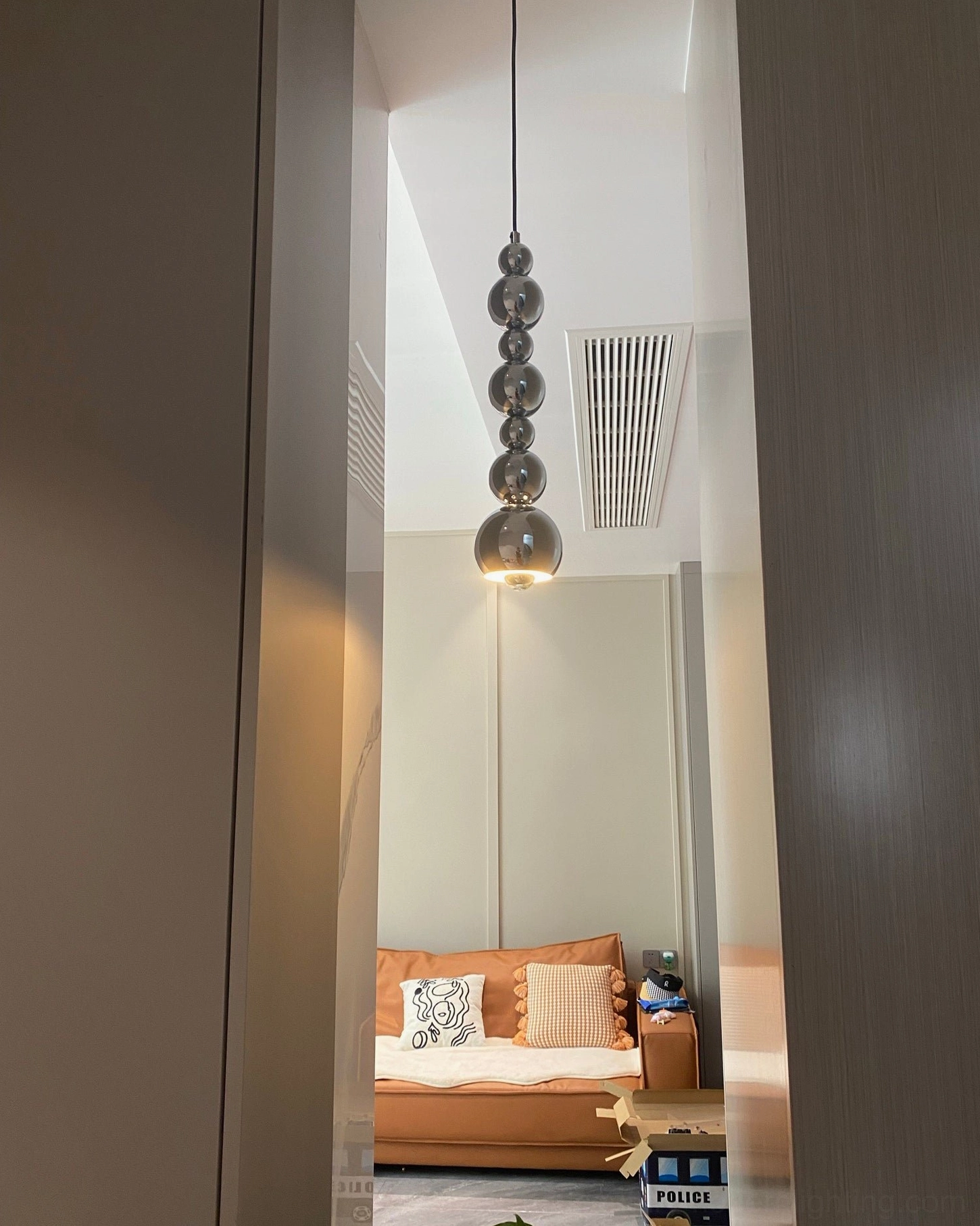 Energy-efficient LED integrated globe pendant light reducing electricity costs while providing bright illumination
