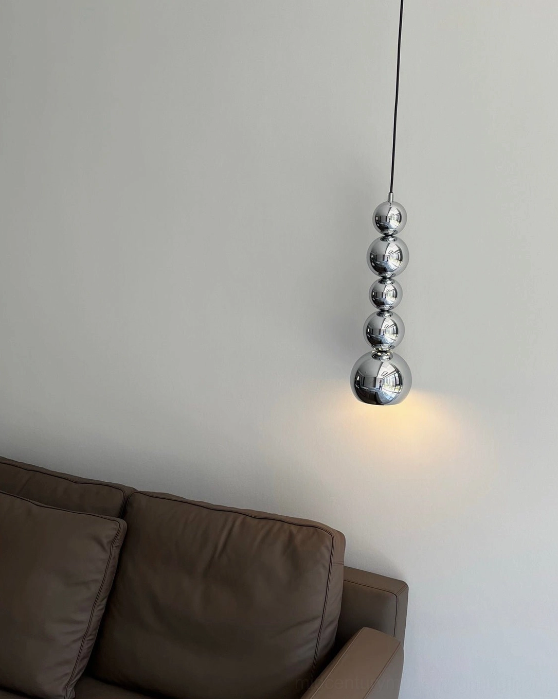 Stacked chrome globe pendant showing LED integrated lighting and even light distribution