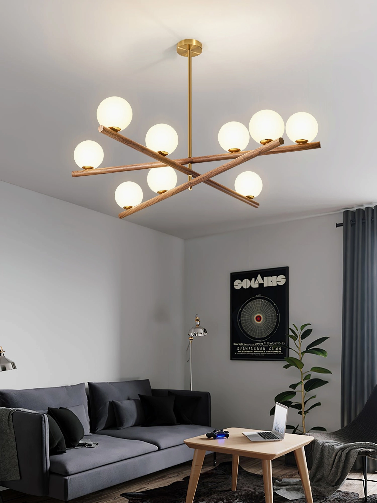 Nordic style dining room with sputnik wood chandelier providing focal lighting over dining table and modern furniture