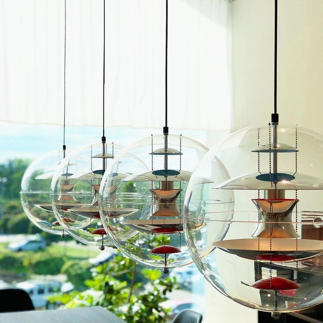 Globe pendant lighting design detail showing layered shade construction and optical clarity