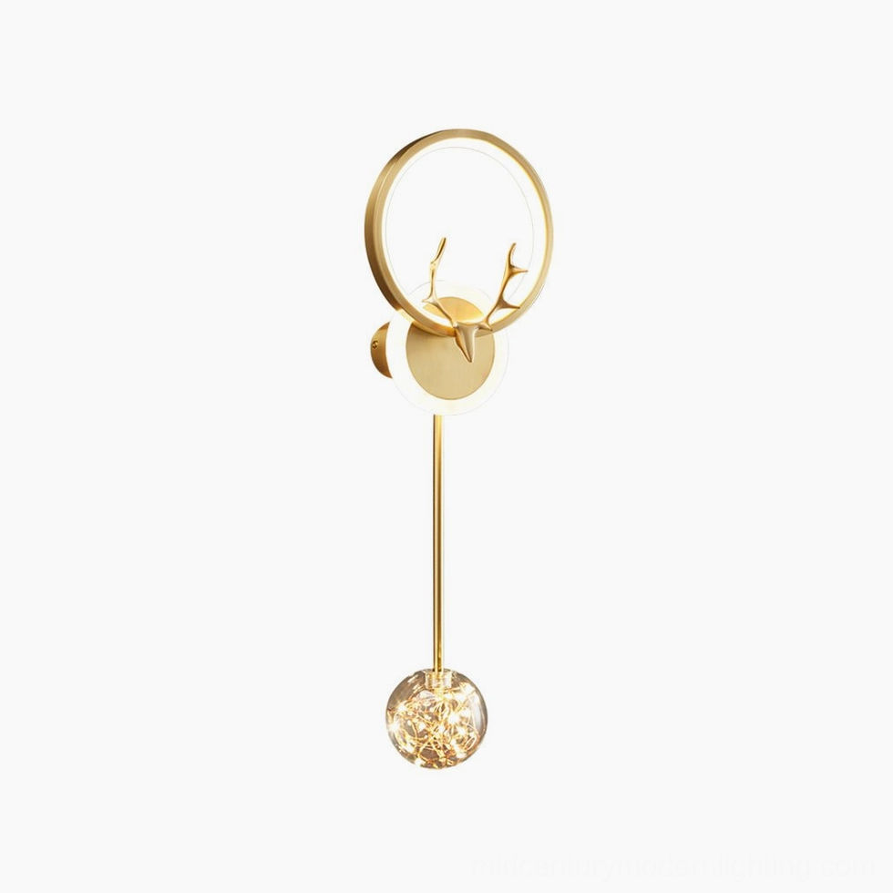 Gold antler wall sconce with ring frame design and glass pendant, modern nordic style lighting on white studio background