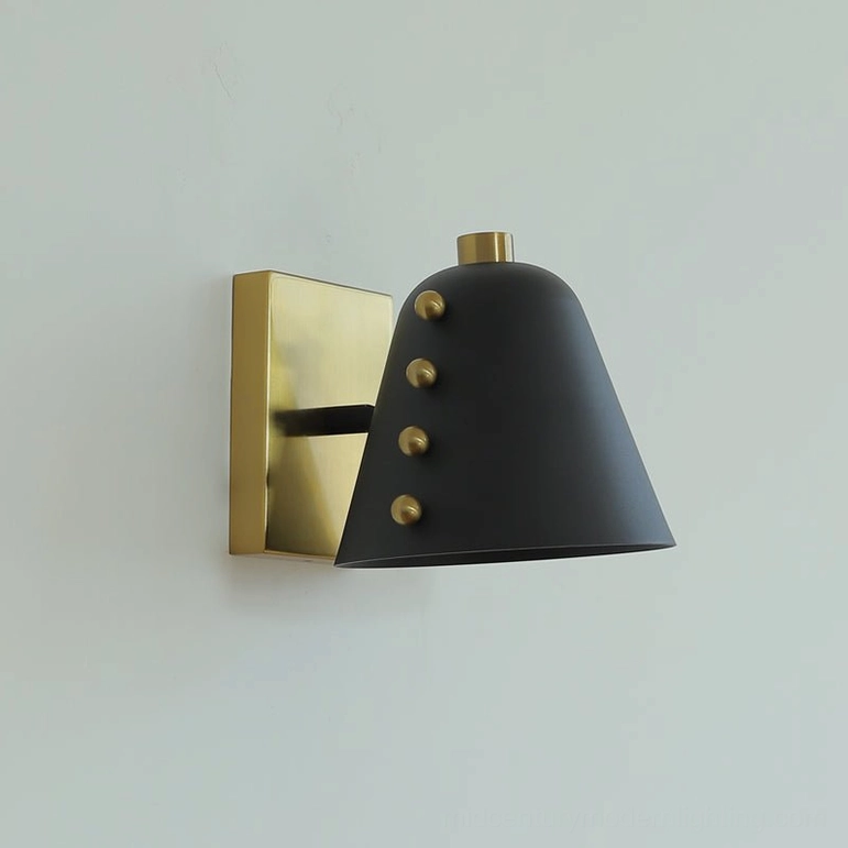 Gold and black two-tone geometric wall lamp product display on white studio background