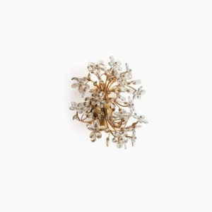 Crystal flower wall sconce with warm gold finish, overhead studio view, delicate faceted crystal petals arranged in botanical clusters