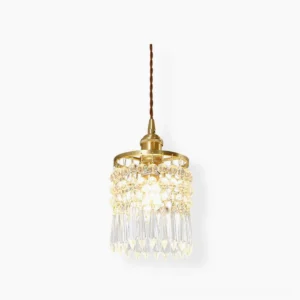 Gold crystal pendant light with tiered clear crystal beads, front studio view