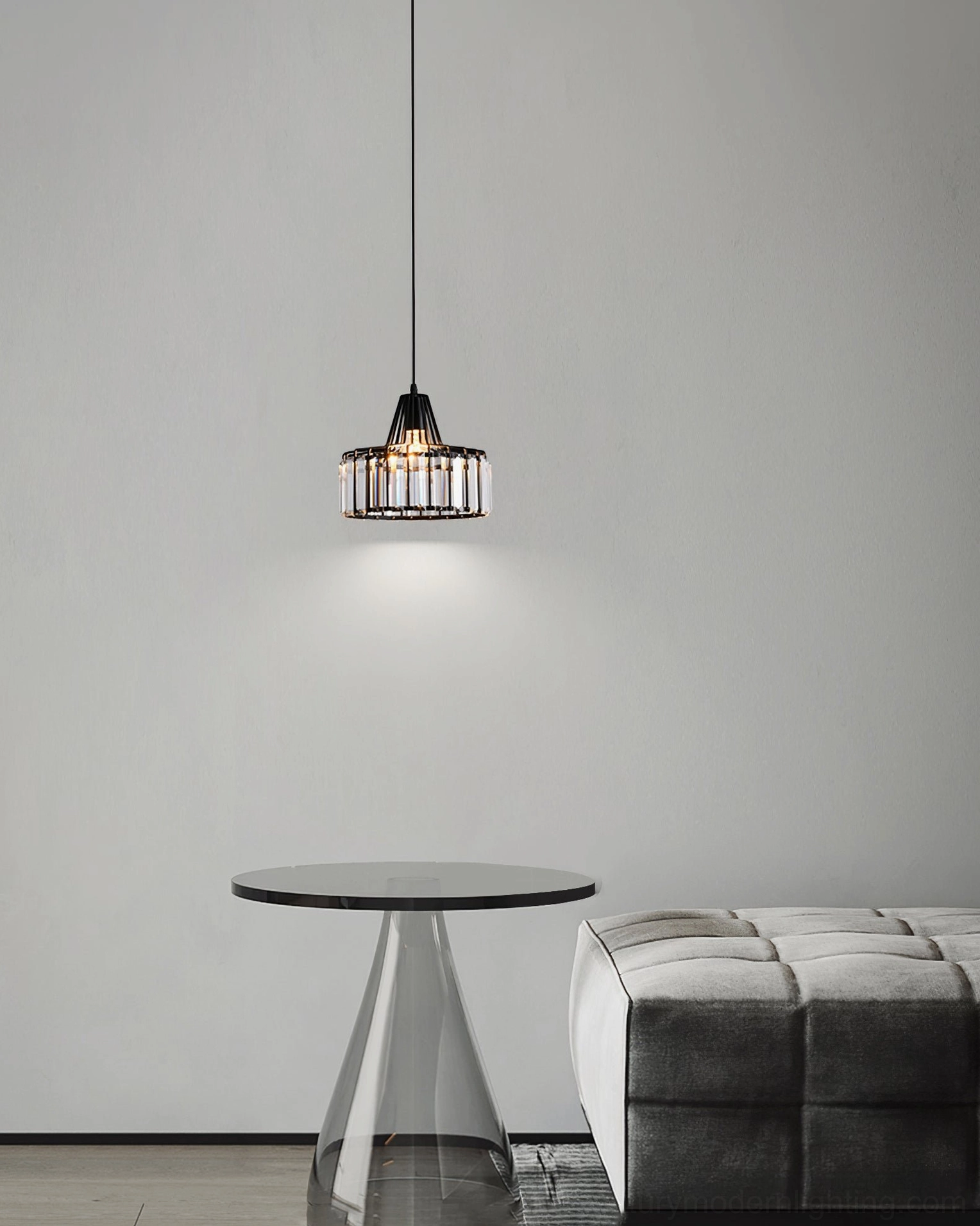 Crystal pendant light in gold finish with luxury material aesthetic and modern geometry