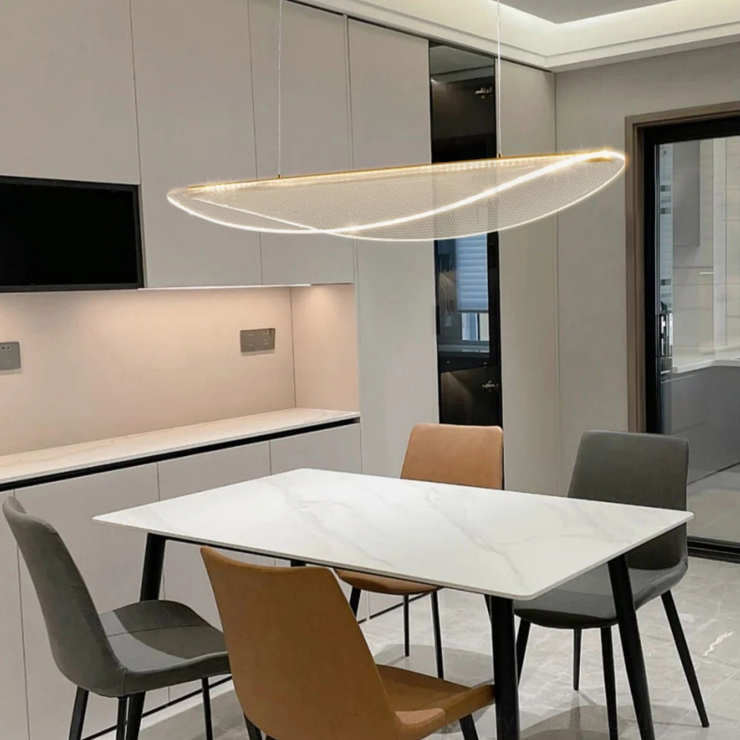 Gold and clear frosted pendant light showcasing luxury modern design details