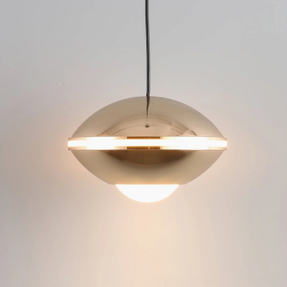 Gold finish disc pendant light in modern interior, warm metallic contemporary lighting design