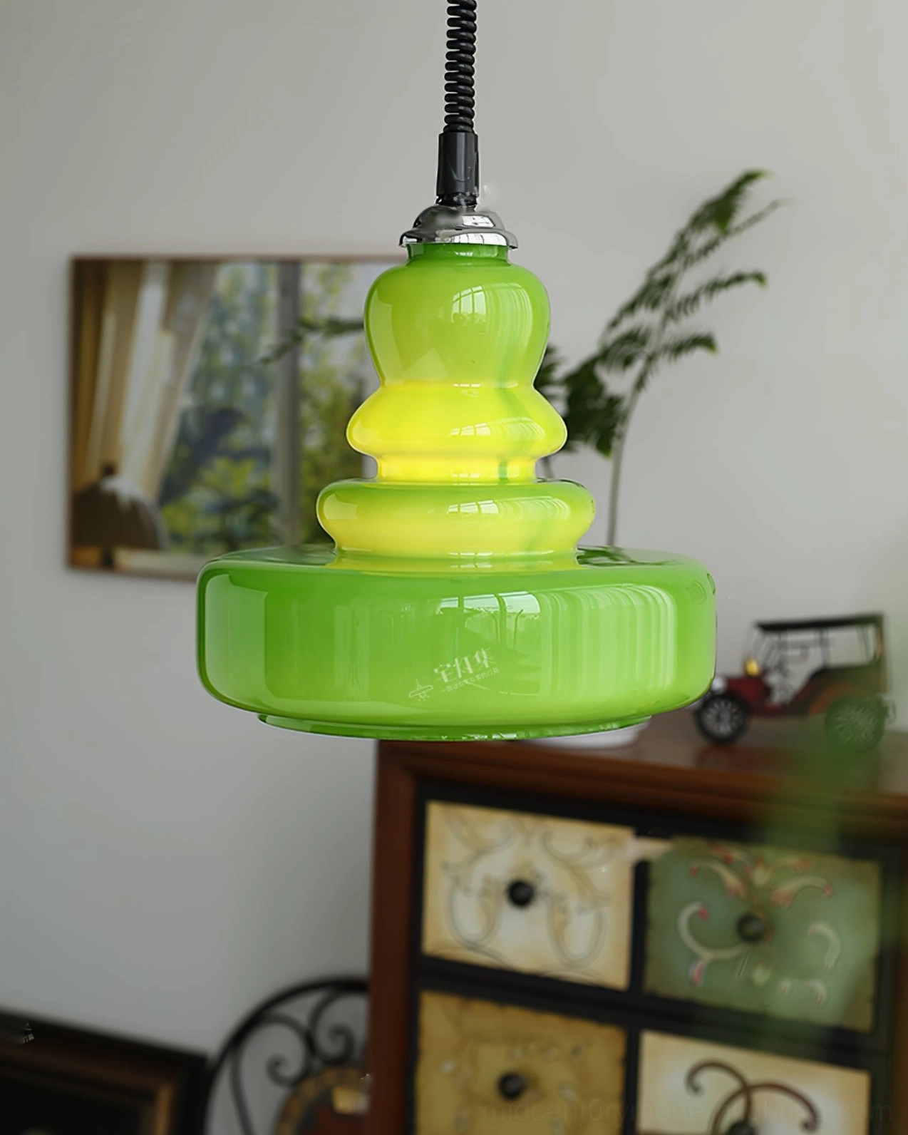 Gourd glass pendant light in multiple color options showing tiered stacked design and versatile interior styling
