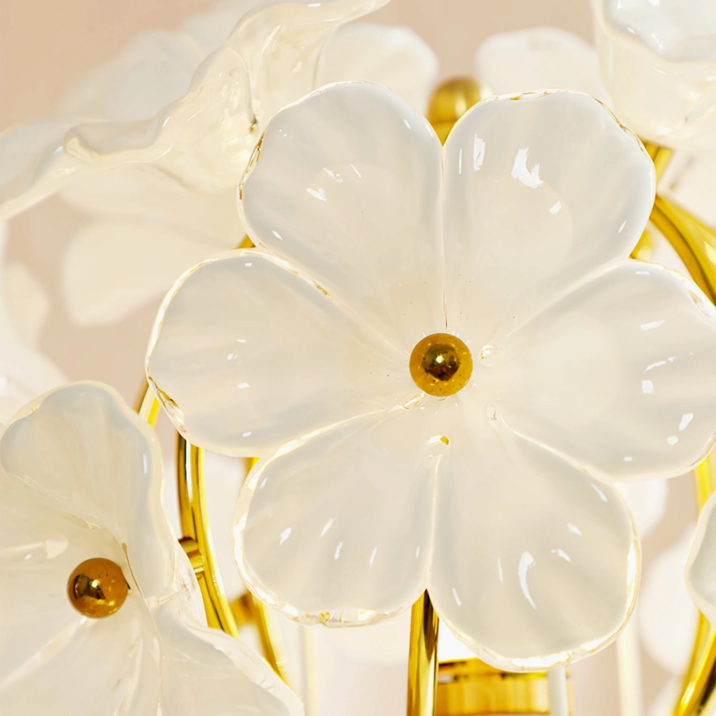 Close-up detail of Grace Floral Lamp translucent glass petals with golden flower center