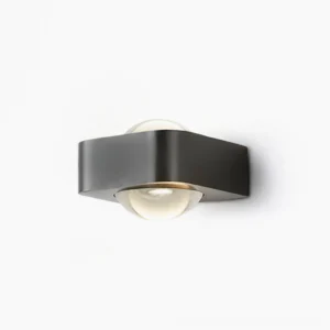Grace modern wall sconce in matte black with integrated LED, front studio view