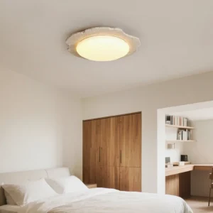 Gracie Ceiling Light Installed in Minimalist Bedroom - Overhead View Showing Warm Ambient Lighting
